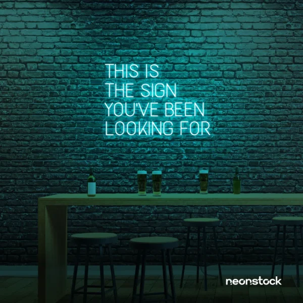 This Is The Sign You’ve Been Looking For neon sign in mint green for modern wall decor and motivational rooms.