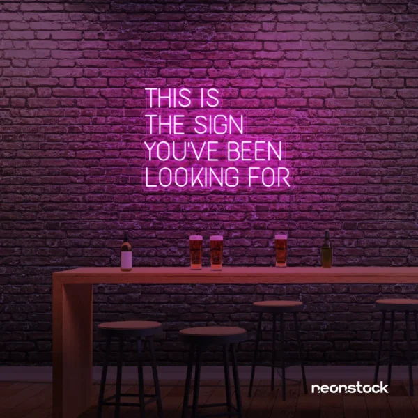 This Is The Sign You’ve Been Looking For neon sign in pink for modern wall decor and motivational rooms.