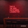 This Is The Sign You’ve Been Looking For neon sign in red for modern wall decor and motivational rooms.