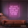 We Have Nothing to Lose and a World to See neon sign in baby pink for travel wall art and decor lovers.