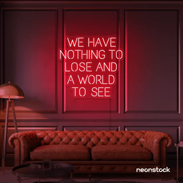 We Have Nothing to Lose and a World to See neon sign in red for travel wall art and decor lovers.