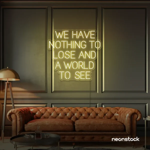 We Have Nothing to Lose and a World to See neon sign in warm white for travel wall art and decor lovers.