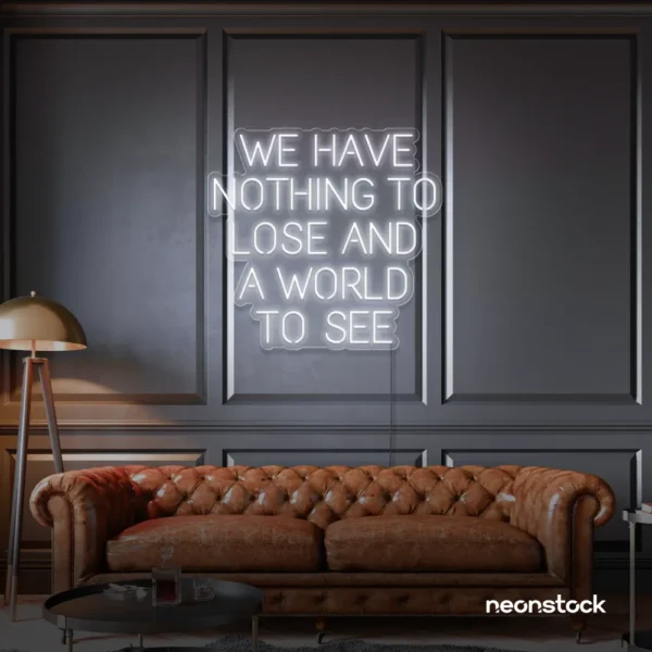 We Have Nothing to Lose and a World to See neon sign in white for travel wall art and decor lovers.