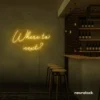 Where To Next neon sign in golden yellow