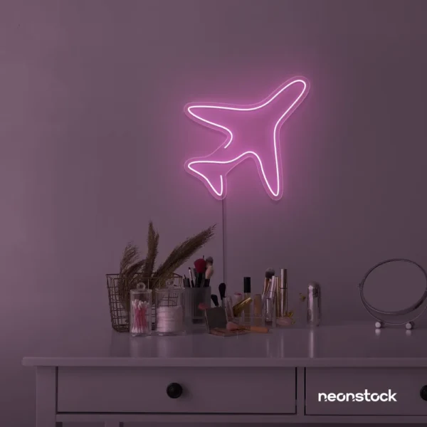 Aeroplane neon sign in baby pink for kids' rooms, nursery travel themes, and pilot-inspired decor.