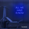 All We Have Is Now neon sign in dark blue for modern wall decor, dorms, and cozy interiors.