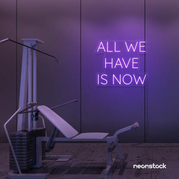 All We Have Is Now neon sign in purple for modern wall decor, dorms, and cozy interiors.
