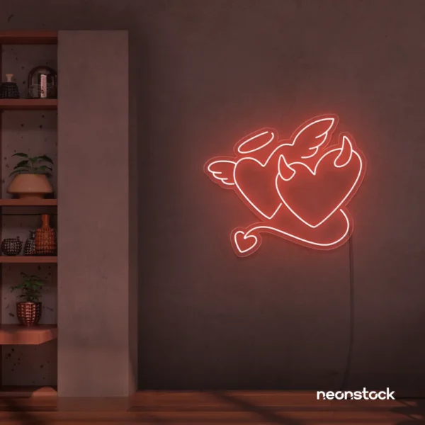 Devil and angel heart neon sign in peachy pink for romantic and edgy room decor.