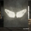 Elegant angel wings neon sign in neutral white for wall art or restaurant decor.