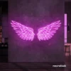 Elegant angel wings neon sign in pink for wall art or restaurant decor.