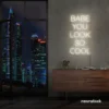 Babe You Look So Cool neon sign in neutral white for glam rooms, salons, and modern home decor.
