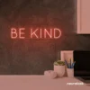 Be Kind neon sign in peachy pink for wellness spaces, classrooms, offices, and mindful decor.