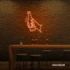 Beer bottle neon sign in orange for bar or man cave wall decor.