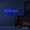 Blessed neon sign in dark blue for spiritual decor, homes, and motivational spaces.