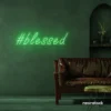 Blessed neon sign in green for spiritual decor, homes, and motivational spaces.