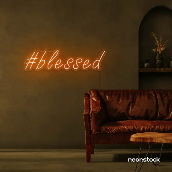Blessed neon sign in peachy pink for spiritual decor, homes, and motivational spaces.