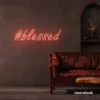 Blessed neon sign in peachy pink for spiritual decor, homes, and motivational spaces.