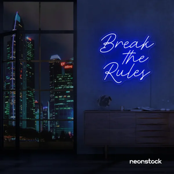Break the Rules neon sign in dark blue for rebellious decor, creative studios, and bold interiors.