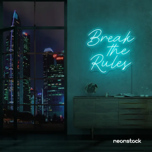 Break the Rules neon sign in mint green for rebellious decor, creative studios, and bold interiors.