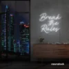 Break the Rules neon sign in white for rebellious decor, creative studios, and bold interiors.