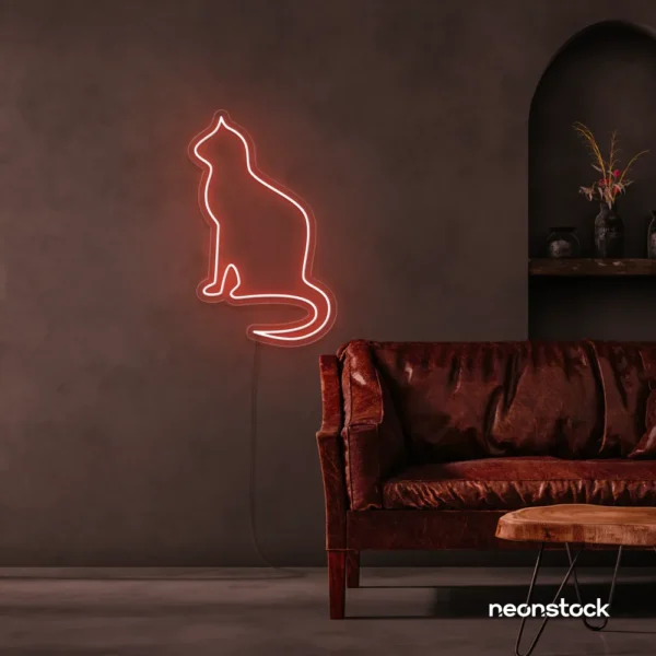 Cat neon sign in peachy pink for pet lovers, bedroom wall decor, and cozy spaces.