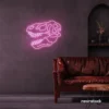 Dinosaur skull neon sign in baby pink for prehistoric wall art and edgy decor.