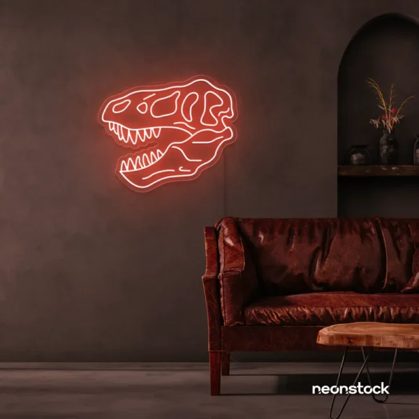 Dinosaur skull neon sign in peachy pink for prehistoric wall art and edgy decor.