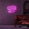 Dinosaur skull neon sign in pink for prehistoric wall art and edgy decor.