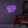 Dinosaur skull neon sign in purple for prehistoric wall art and edgy decor.