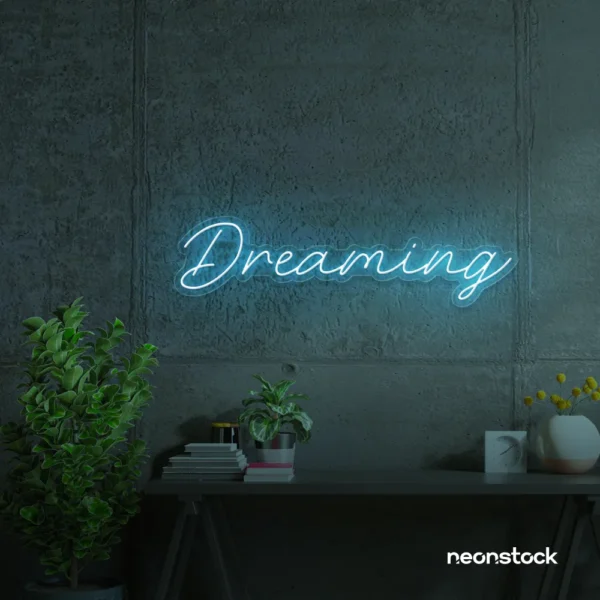 Dreaming neon sign in ice blue for dreamy decor, teen bedrooms, and relaxing nooks.