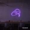 Spilling drink cup neon sign in purple for coffee shops, juice bars, and beverage-themed decor.