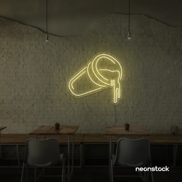 Spilling drink cup neon sign in warm white for coffee shops, juice bars, and beverage-themed decor.