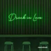 Drunk In Love neon sign in deep green for wedding decor, engagement parties, romantic celebrations