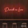 Drunk In Love neon sign in peachy pink for wedding decor, engagement parties, romantic celebrations