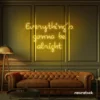 Everything's Gonna Be Alright neon sign in golden yellow for calming interiors, wellness decor, and positive spaces.