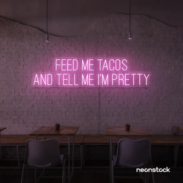 Feed Me Tacos And Tell Me I'm Pretty neon sign in baby pink for taco bars, restaurants, and fun home decor.