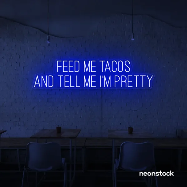 Feed Me Tacos And Tell Me I'm Pretty neon sign in dark blue for taco bars, restaurants, and fun home decor.