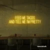 Feed Me Tacos And Tell Me I'm Pretty neon sign in golden yellow for taco bars, restaurants, and fun home decor.