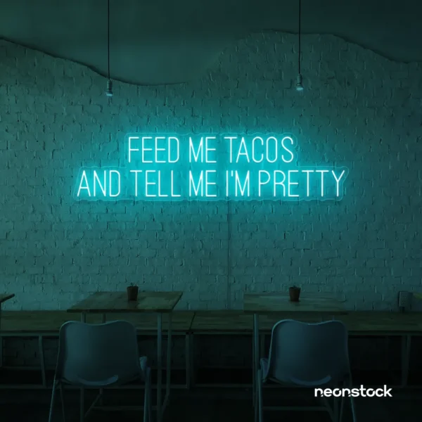 Feed Me Tacos And Tell Me I'm Pretty neon sign in mint green for taco bars, restaurants, and fun home decor.