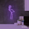 Flamingo neon sign in purple for kids room or tropical-themed decor