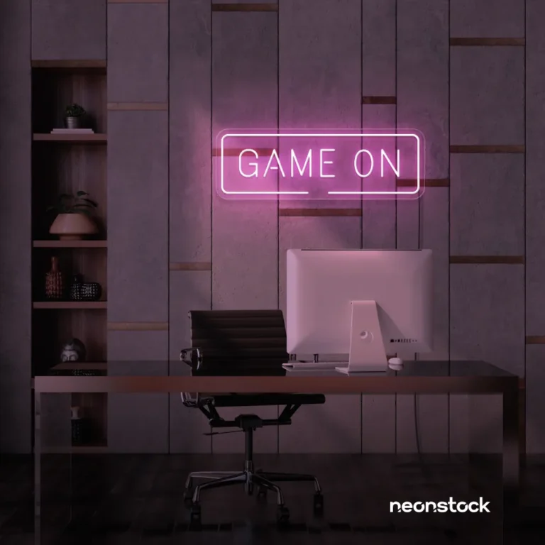 Game On neon sign in baby pink for gaming setups, man caves, and kids' rooms.