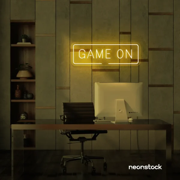 Game On neon sign in golden yellow for gaming setups, man caves, and kids' rooms.