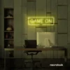 Game On neon sign in lemon yellow for gaming setups, man caves, and kids' rooms.