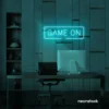 Game On neon sign in mint green for gaming setups, man caves, and kids' rooms.