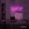 Game On neon sign in baby pink for gaming setups, man caves, and kids' rooms.