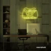 Gaming controller neon sign in lemon yellow for game rooms, stream setups, and kids' walls.