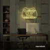 Gaming controller neon sign in warm white for game rooms, stream setups, and kids' walls.
