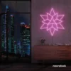 Geometric neon sign in baby pink – stylish LED wall decor for modern interiors.