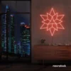 Geometric neon sign in peachy pink – stylish LED wall decor for modern interiors.
