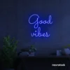 Good Vibes neon sign in dark blue for positive room decor, dorm walls, and relaxing interiors.